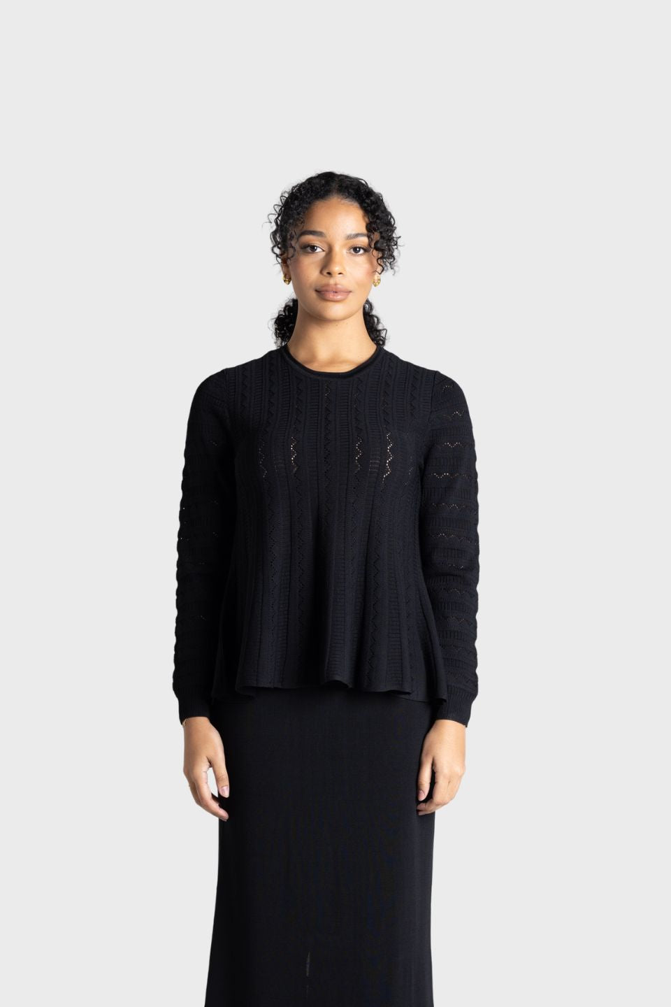 Milano Pointelle Peplum Top