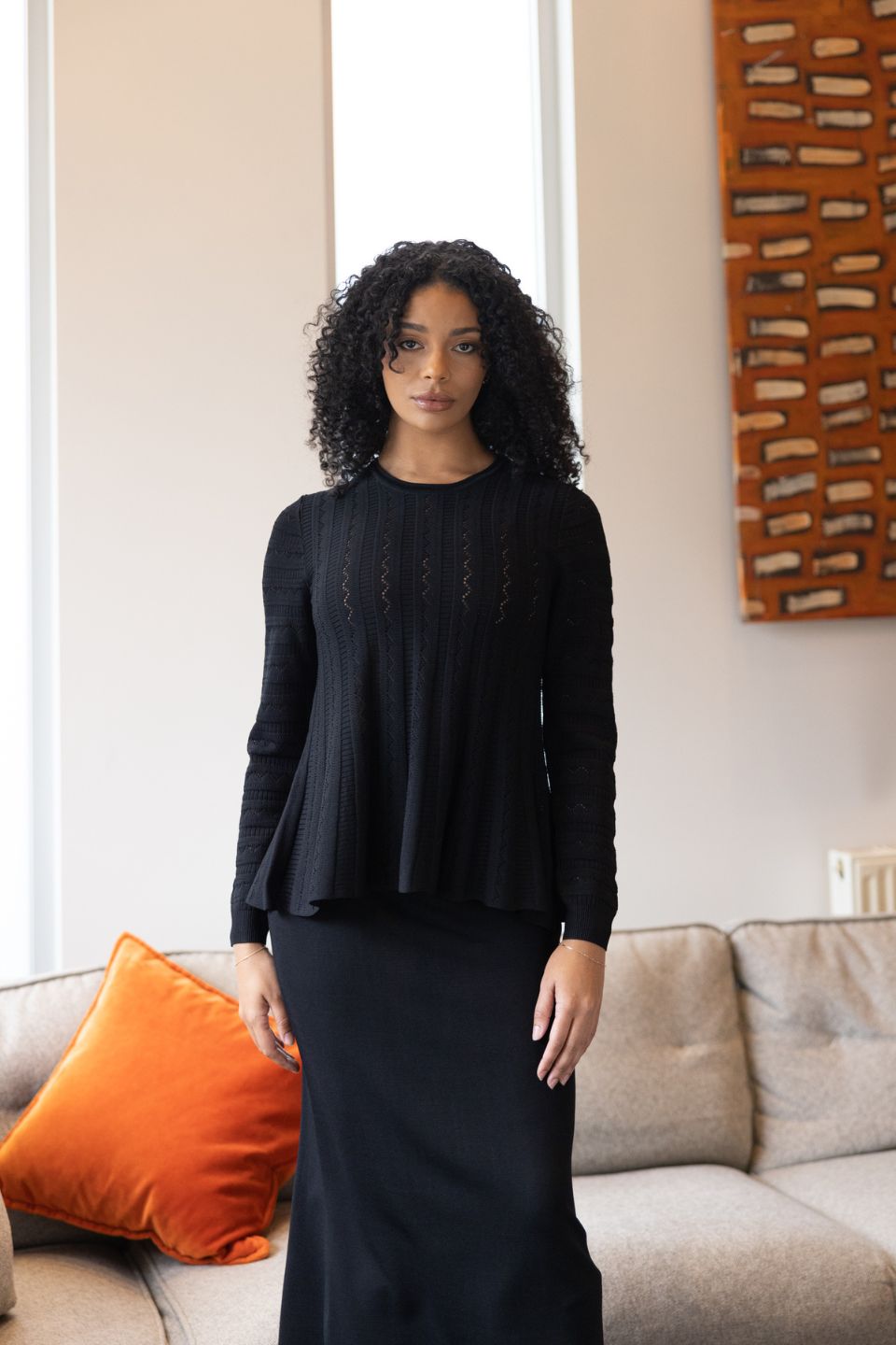 Milano Pointelle Peplum Top
